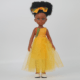 Ravissante Poupée noire Bontle avec cheveux crépus et magnifique robe jaune