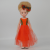 Poupée albinos avec cheveux crépus avec robe orange