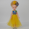 Poupée albinos avec cheveux crépus à coiffer et belle robe jaune